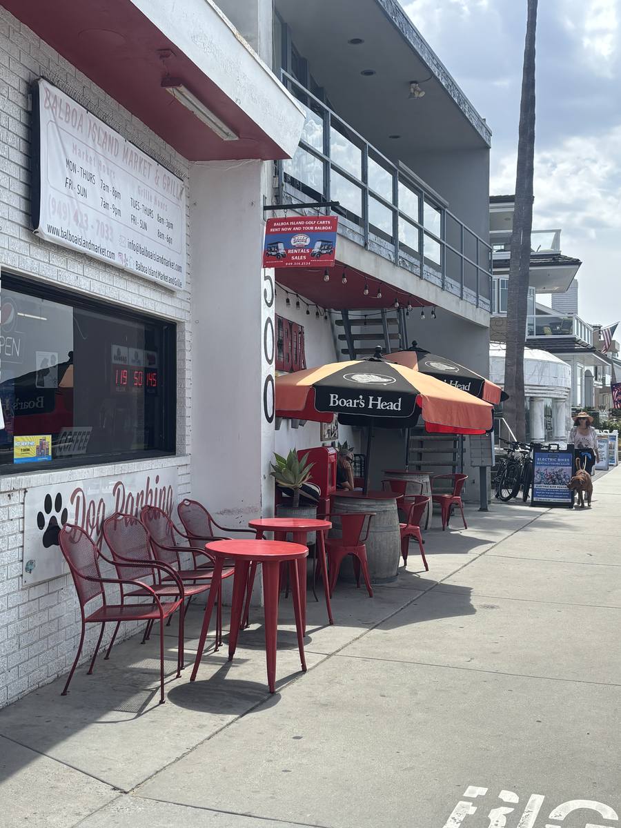 Sidewalk tables outside Balboa Island Market & Grille on South Bay Front